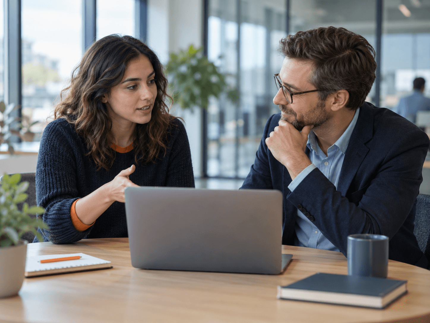 Professionals discussing a project together
